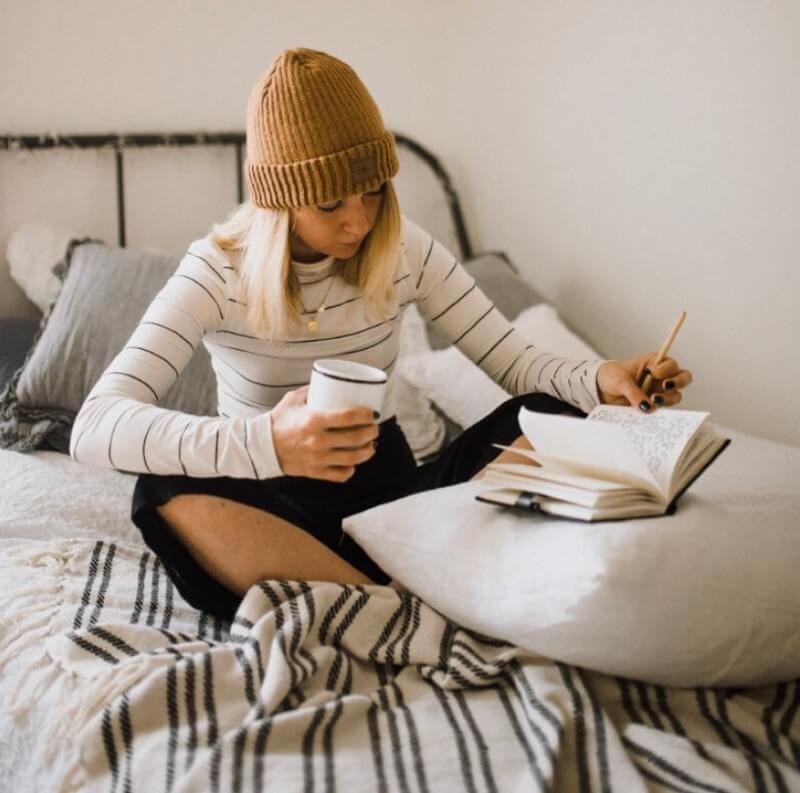 A girl writing in a notebook